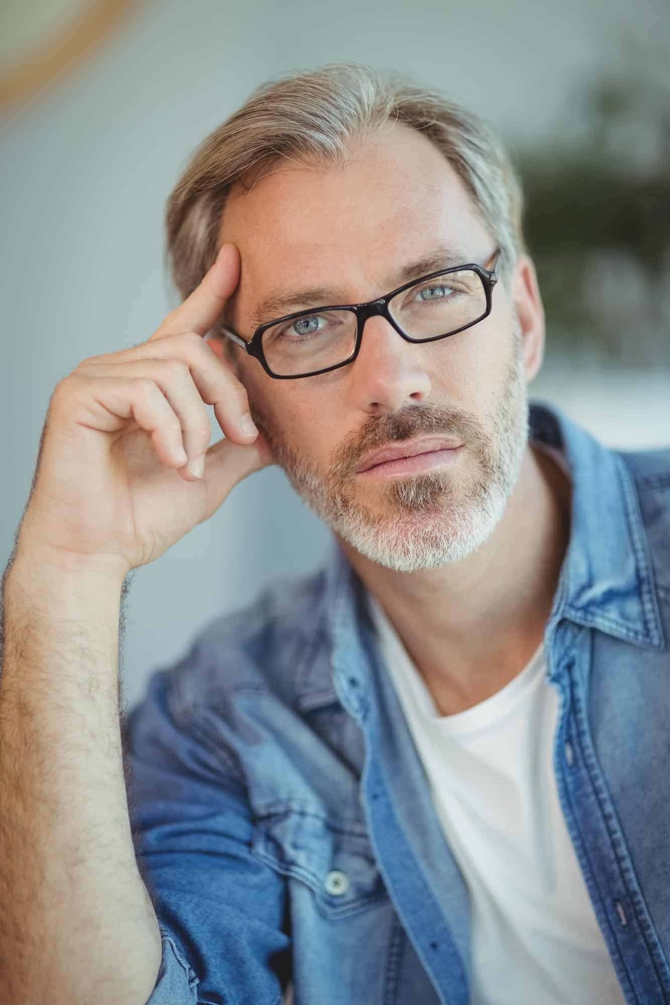 portrait-of-male-executive-in-office.jpg